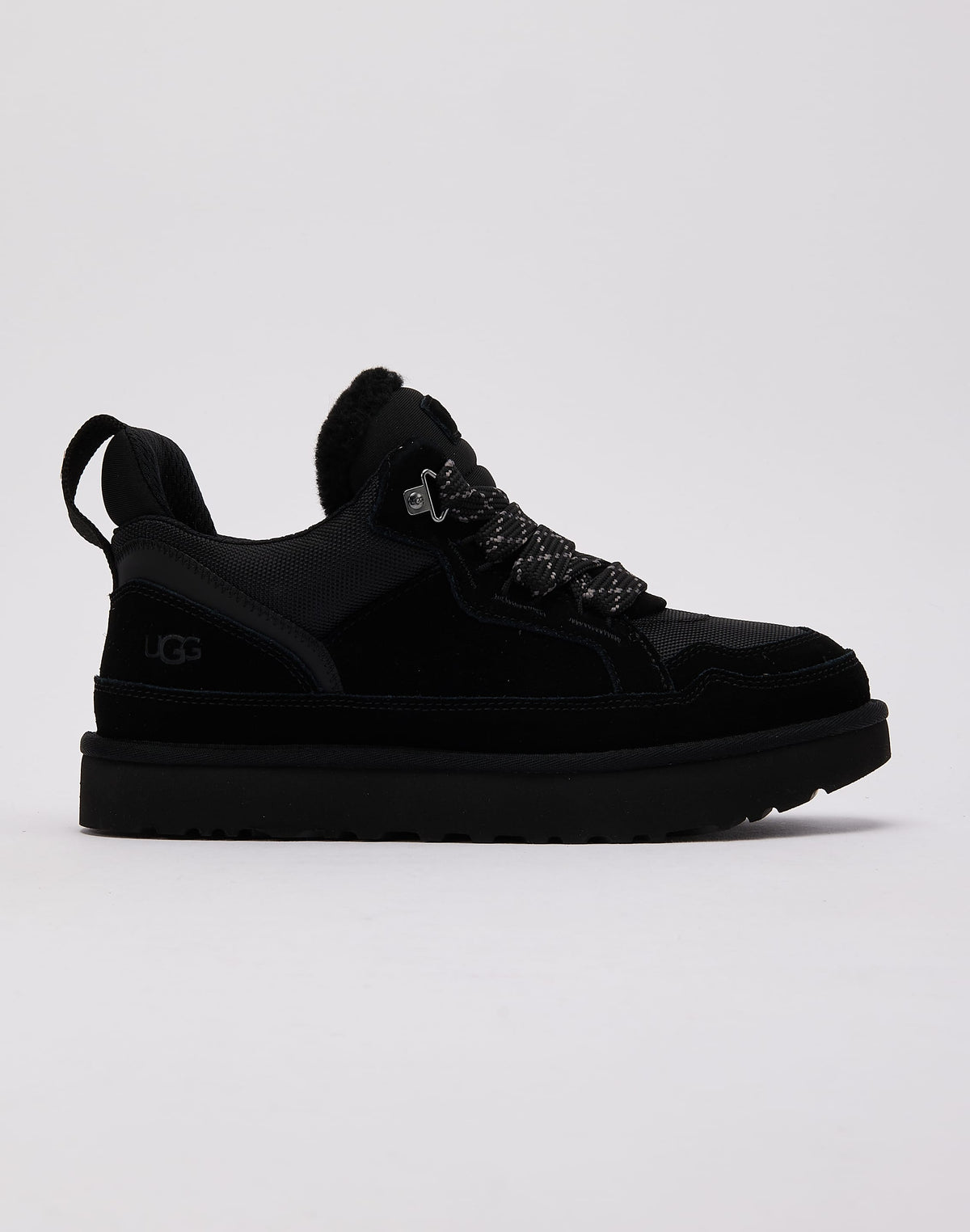Black lace-up sneakers — original product photo